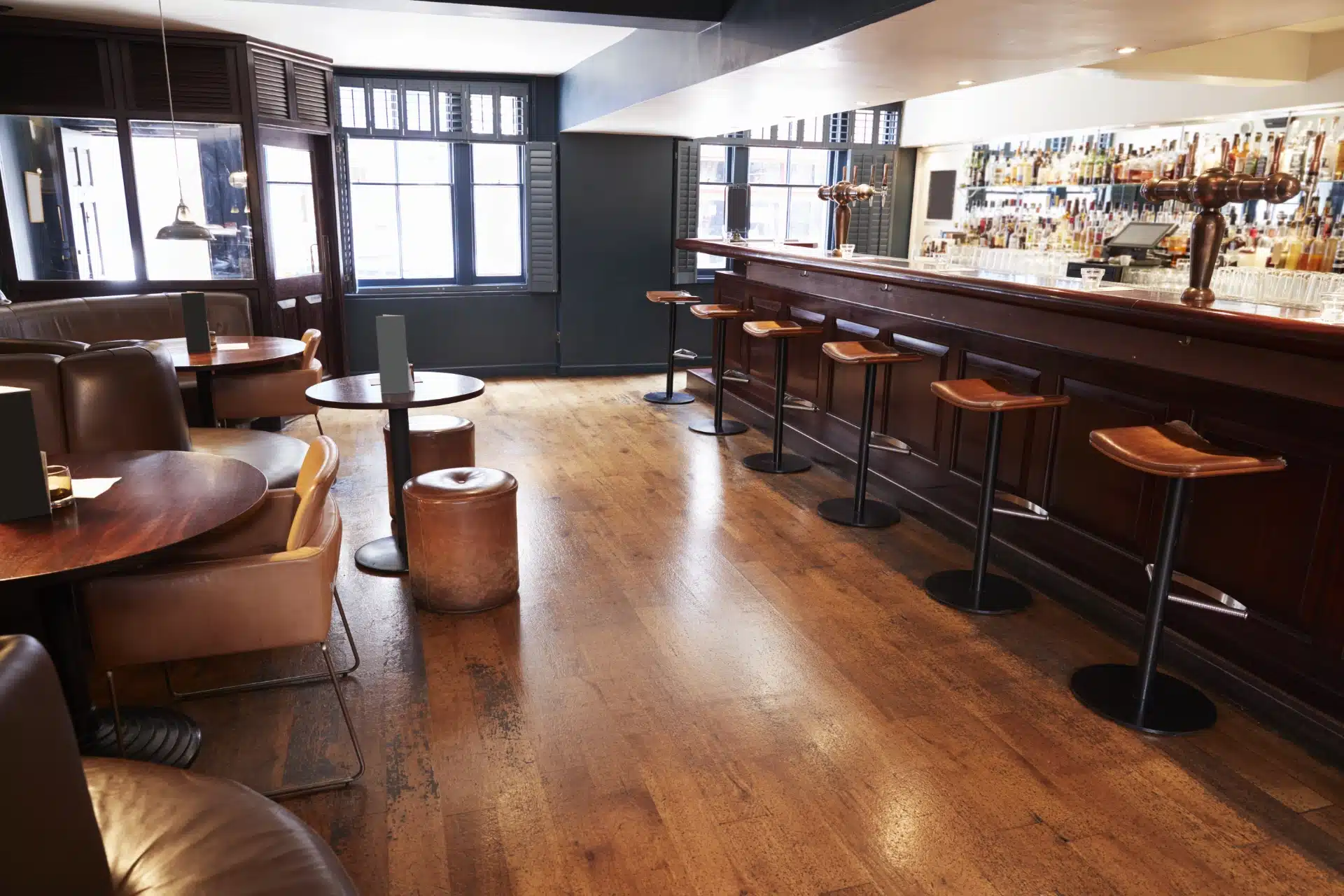 interior-of-empty-bar-with-stools-and-counter-2023-11-27-04-55-10-utc